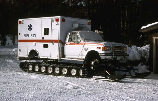 Ambulance on snow tracks in the Old Faithful area Picture