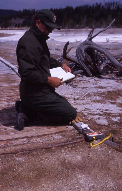 Hank Heasler taking temperature of ground 1