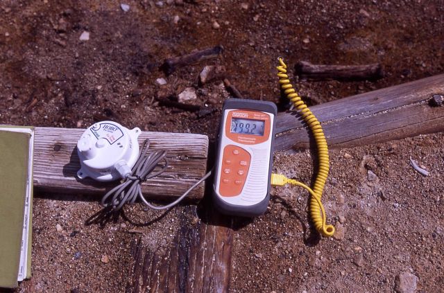 Hank Heasler taking temperature of ground 1