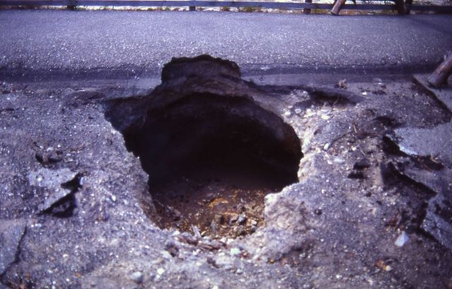 Fumerole started in 1999 under pavement - Mud Volcano Picture