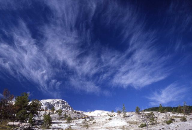 Wide angle view of Mammoth Terraces with whispy clouds - Mammoth Hot Springs Picture