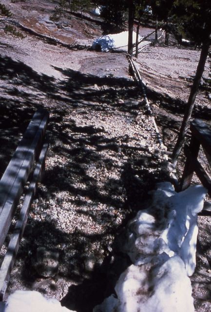 Gravel washed onto walk from Steamboat Geyser eruption - Norris Geyser Basin Picture