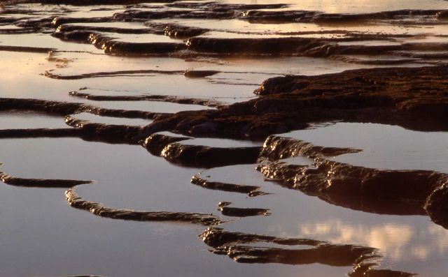 Sinter terraces - Fountain Paint Pot area - Mineral deposits Picture