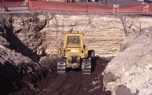 Travertine wall in excavation pit (behind YCR building) - Mineral deposits Picture
