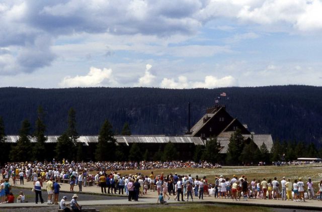 Crowd at Old Faithful Geyser with Old Faithful Inn in the background Picture
