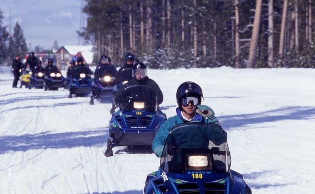 Snowmobiles lined up at West entrance in the winter Picture