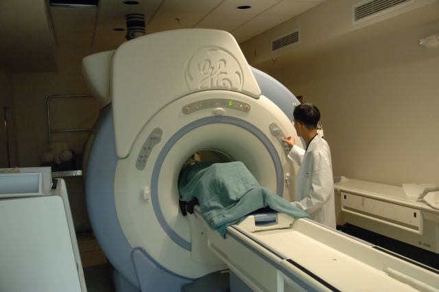 MRI machine with patient inside Picture
