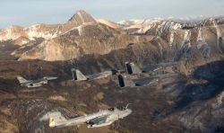 Two F-15E Strike Eagles, an F-15 Eagle, an F-16 Fighting Falcon and an EA-6B Prowler - Five-ship formation - The sound of freedom over Idaho Photo