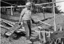 Elder Man with Fish Racks Image