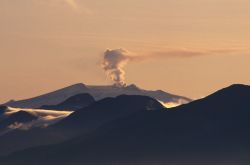 Makushin Volcano smoking away on the west end of Unalaska Island Image
