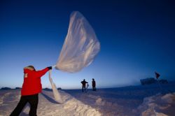 Launching an ozonesonde balloon Image