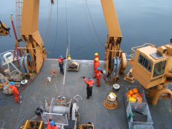 Deploying instrument package from stern of USCGC HEALY Image