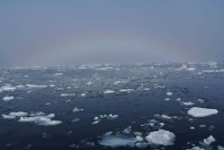 A rare phenomenom known as an ice blink rainbow. Image