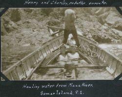 Taking a cool refreshing bath while loading water for the ship from the Mauo River Image
