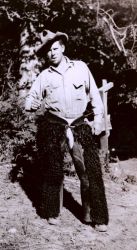 Floyd Risvold dressed up in Cowboy Roy Bixby's hat and wool chaps Image