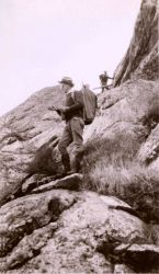 Lieutenant Charles Pierce getting his bearings on the way to a triangulation station in the Santa Lucia Mountains. Image