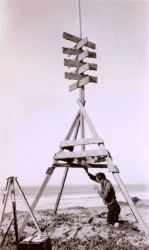 George Blair setting up for triangulation observations somewhere on the Big Sur coastline. Image