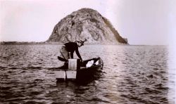 Lieutenant Charles Pierce, chief of party, proceeding to triangulation station on top of Morro Rock Image