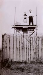 Floyd Risvold setup and ready to begin observations at a California-Mexico border monument. Image