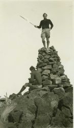 Floyd Risvold on top of cairn marking station El Paso near Randsburg. Image