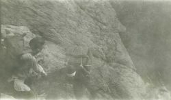 Packers lending each other helping hands as making way to the top of 10,627 foot Hawk Peak in the Pinaleno Mountains Image