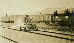 A gasoline powered velocipede underway near a railroad siding on the Anchorage to Fairbanks railway. Image