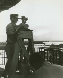 Observing horizontal angles with a Wild T-3 theodolite from a lighthouse. Image