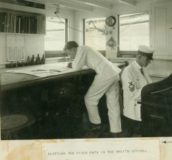 Plotting the field data in the ship's office Image