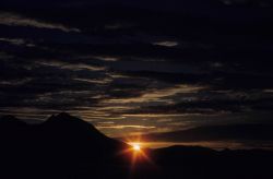 A spring dawn while approaching Adak. Image