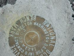 A National Ocean Service benchmark used to determine elevations Image