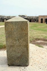 Granite obelisk used to designate one of the end points of the baseline measured by Alexander Dallas Bache on Dauphin Island in 1847 Image