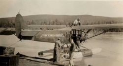 Fueling Wien Alaska Airlines float plane by hand Image