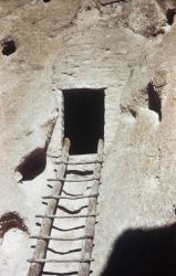 A ladder in the cliff dwellings at Bandelier. Image