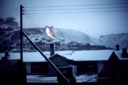 Molten slag being poured on the dump at the coppermill at Miami. Image