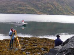 Leveling tide staff and bench marks. Image