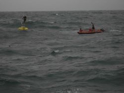 FOCI (Fisheries Oceanography Coordinated Investigations) buoy mooring operations off the NOAA Ship MILLER FREEMAN. Image