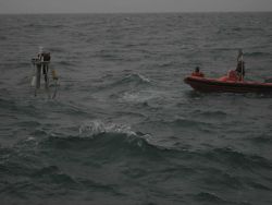 FOCI (Fisheries Oceanography Coordinated Investigations) buoy mooring operations off the NOAA Ship MILLER FREEMAN. Image