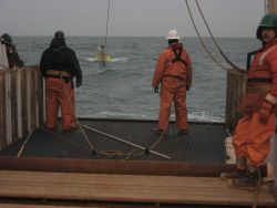 FOCI (Fisheries Oceanography Coordinated Investigations) buoy mooring operations off the NOAA Ship MILLER FREEMAN. Image