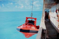 Rigid hull inflatable boat ready for deployment somewhere warm - an oddity for the MILLER FREEMAN. Photo