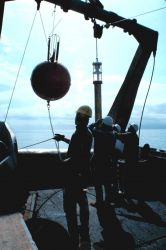 Buoy with tethered current meter being launched during Gulf Stream eddy studies from NOAA Ship ALBATROSS IV. Image