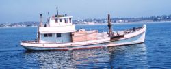 An oyster boat dredging Image