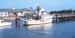 A shrimp boat at the pier Image