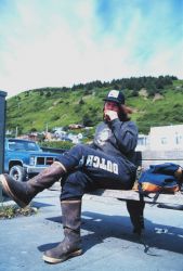 A salty dog if I ever saw one plays the harmonica on a warm Kodiak day Image