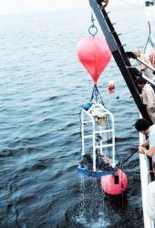 Water sampling instrument and float being recovered Image