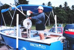 Maintaining gear on one of the small boat fishing fleet vessels Image