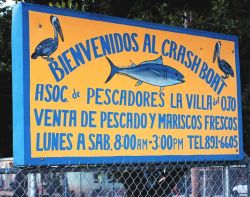 A sign advertising the Fishermen's Association of Crashboat Image