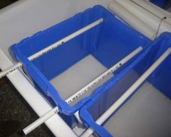 Empty plastic unit with mesh bottom used for holding clam spat at Harbor Branch Oceanographic Institute Image