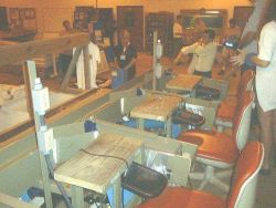 Assembly line style fish tagging system at the Florida Stock Enhancement Research Facility Image