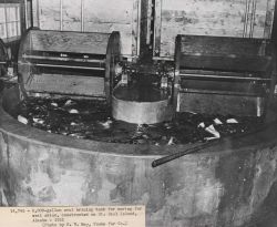5,000 gallon oval brining tank for curing fur seal skins. Image