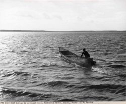 Eskimo in boat with outboard motor on Kuskokwim River Image